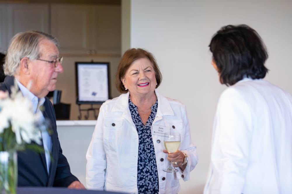 President Mantella talking with Happy Fox and Jane Ritter